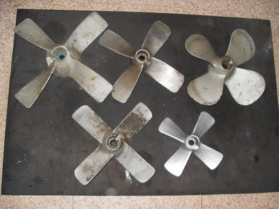 top centre is a 4 bladed &quot;hydrofan&quot; for a 102.<br />A &quot;cloverleaf&quot; will look very similar to the prop at top right even though this is for a century motor. 102 props have a slightly smaller hub than their cousins.