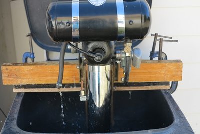 Water feed pipe off, water flowing.JPG