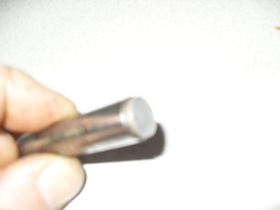same at both ends, slightly rounded, not sure if these are a press-fit but definitely polished and different material to the pin.