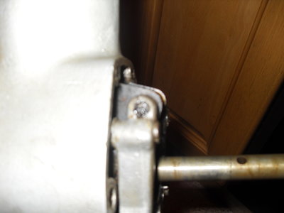 there's a roll pin at the top which must be removed first before the pivot then the bracket